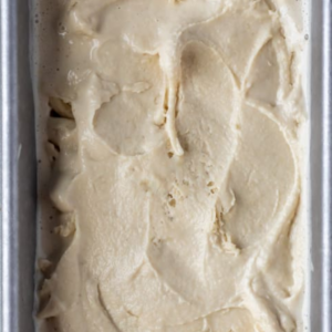 The image shows freezed oat milk ice cream in a container
